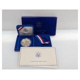 1986 90% Silv Ellis Island Comm $1