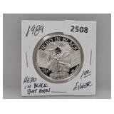 1989 1oz .999 Silv Hero in Black Round
