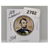 JFK Half $1 w/Lincoln Sticker