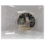 1986 90% Silv Ellis Isl Comm $1 Dollar