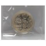 1986 90% Silv Ellis Isl Comm $1 Dollar