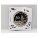 1986 90% Silv Ellis Isl Half $1 Dollar