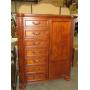 CHERRY FINISH 7 DR/ 1 DOOR CHEST