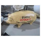 CAST IRON FINCKS OVERALLS PIG BANK