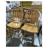 ( 2) SOILD WOOD SWIVEL BAR STOOLS
