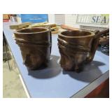 PAIR OF HAND CARVED WOODEN TRIBAL FACE MUGS