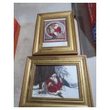 2 GOLD FRAMED SANTA CLAUS PAINTINGS