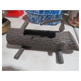 HEAVY CAST IRON LOG WITH AXE PLANTER