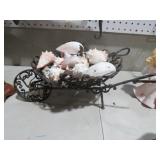 ORNATE METAL WHEEL BARROW WITH SEA SHELLS
