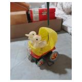VTG METAL & PLASTIC DUCK IN CARRIAGE WIND UP TOY
