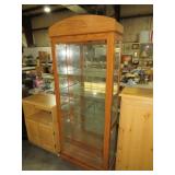 OAK LIKE 4 DR LIGHTED CURIO CABINET