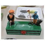 CAST IRON MECHANICAL GOLF BANK