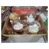 COLLECTION OF SNOW GLOBES AND FIGURINES