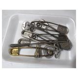 COLLECTION OF EARLY  VINTAGE NUMBERED SAFETY PINS