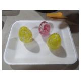 SET OF THREE SWIRLED GLASS DECORATIVE EGGS