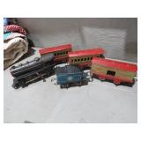 (4) METAL TRAIN CARS WITH METAL ENGINE