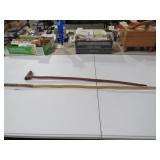(2) HARD CARVED WALKING STICKS