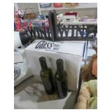CAST IRON WINE SIGN AND TWO GLASS BOTTLES