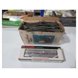 LIONEL BOX CAR WITH BOX OF TRACKS