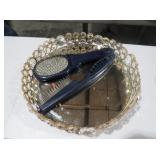 DECORATIVE MIRRORED TRAY WITH GROOMING TOOLS