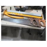 VINTAGE HAND SAW AND YELLOW METAL T-SQUARE