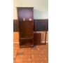 Solid ponderosa pine gun cabinet has hinges and