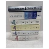 Lot of Sue Grafton books. These look to have
