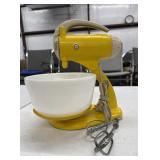 Yellow Vintage Sunbeam Mixmaster stand mixer with