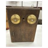 antique wooden ringer box for an early telephone,