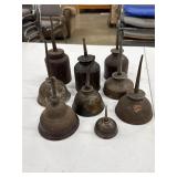 9 Vintage metal oil cans.