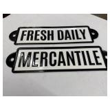 "Mercantile" and "Fresh Daily Enamel Signs Black