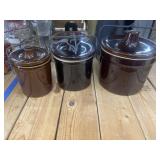 3 Vintage Brown Stoneware Jars with a wire
