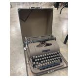 Underwood portable typewriter in its carrying