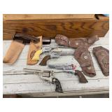 VINTAGE TOY PISTOLS AND HOLSTERS REVOLVERS