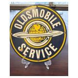 Vintage-style Oldsmobile Service round metal sign
