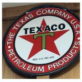 Round Metal sign advertising Texaco Petroleum