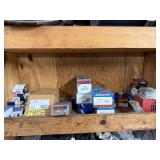 Shelf lot of plugs and coils