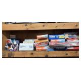 Shelf lot of air filters in boxes, various brands.