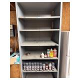 6 foot tall metal shelf with some cans of vinyl