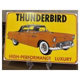 Reproduction tin metal advertising sign featuring