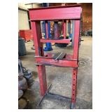 Red Hydraulic Shop Press used for bending,