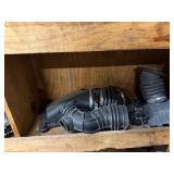 Shelf lot of intake hoses, mechanic auto parts