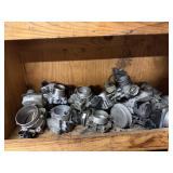 Shelf lot of carburetors auto parts