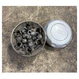 Lot of 4 Ford hubcaps with lug nuts