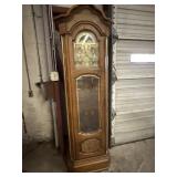 Howard Miller grandfather clock, featuring a