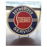 Metal round "Studebaker Authorized Service" sign,