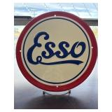 Metal round "Esso" sign, which is an iconic brand