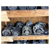 Shelf lot of vehicle alternators, auto parts as-is