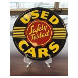 Round ï¿½Used Cars Safety Testedï¿½ Metal Sign.