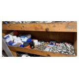 Shelf lot of spark plugs, oil filters, and